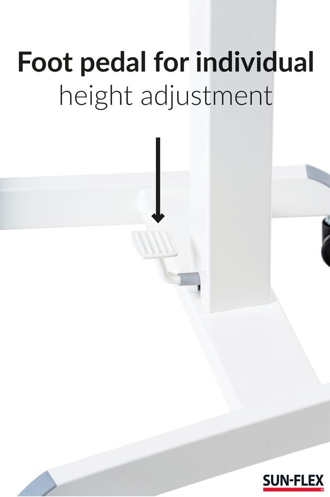 Fotpedal för justering av höjden på ett litet skrivbord.