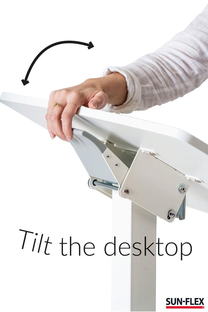 kvinna lutar easy desk pro höj och sänkbara skrivbord